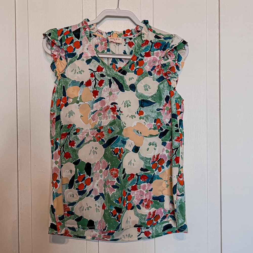 Floral Sleeveless Ruffle Blouse